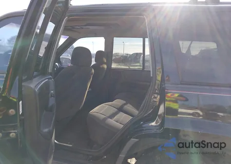 1997 Jeep Grand Cherokee Laredo/Tsi из США, поврежденный, VIN 1J4FX58SXVC567471